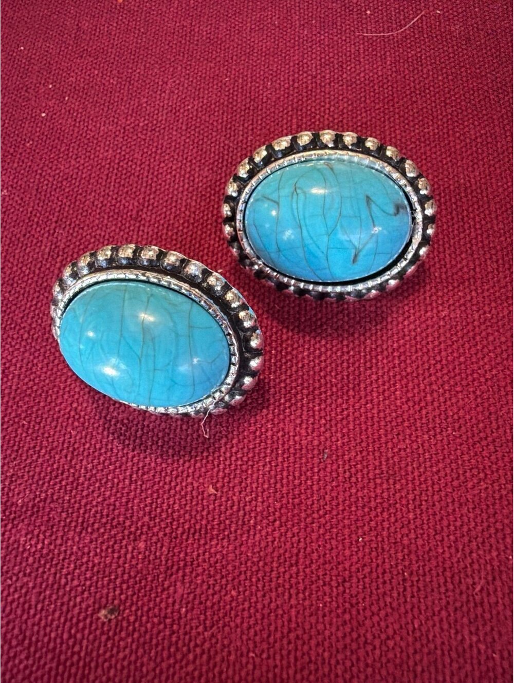 These are a costume jade piercing earrings very lite weight not real stone costu